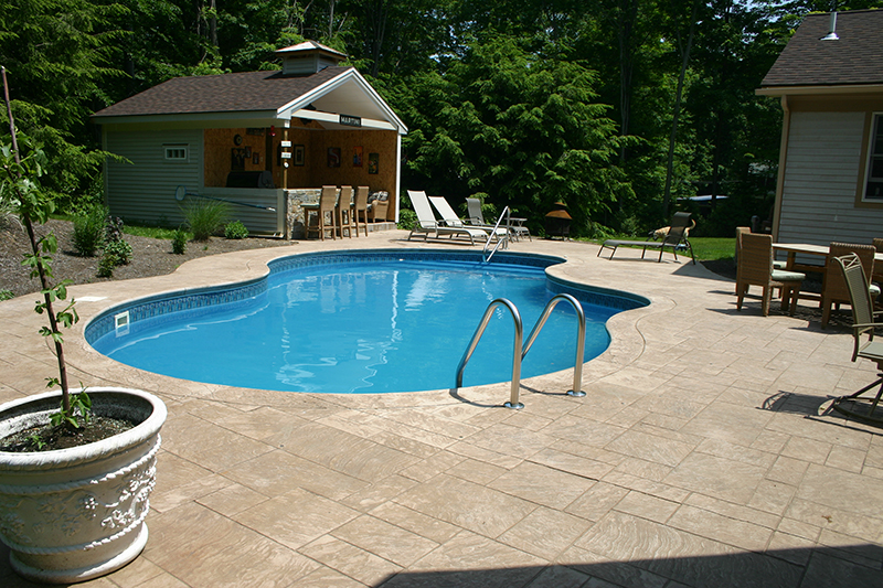Swimming pool and stamped concrete project example 66